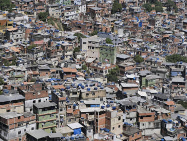 Note the blue water tanks on every roof